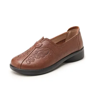 Comfortable brown leather flat shoes for women with elegant floral embroidery detail