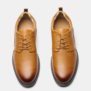 Top view of men's brown business leather shoes with a stylish gradient toe finish