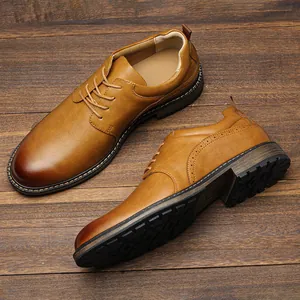 Close-up of stylish brown men's formal leather shoes on a rustic wooden background