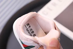 Close-up detail view of pink baby sneakers featuring a breathable insole design