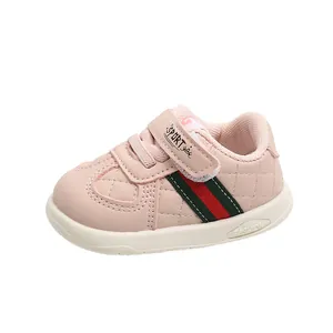 Pink quilted infant toddler sneakers with soft non-slip sole and Velcro strap