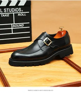 Detailed side profile of black leather monk strap shoe with gold buckle and platform sole