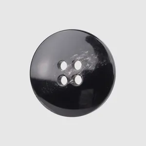 Premium black resin button with four holes and marbled texture for high-end apparel
