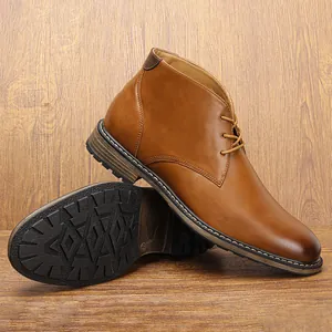 Classic tan leather men's chukka boots featuring a durable non-slip rubber sole detail