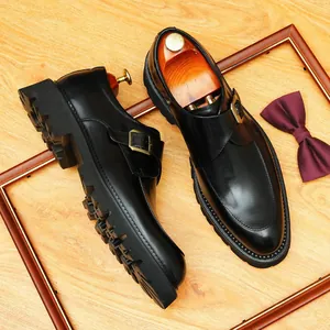 Elegant black leather monk strap shoes with thick rubber lug soles in British style