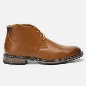 Detailed side view of classic brown men's desert boots with vintage lace-up design