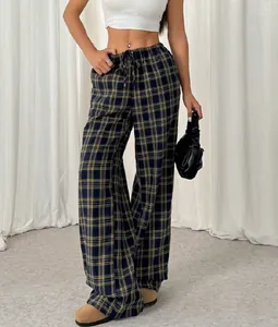 Stylish blue and yellow plaid wide-leg trousers featuring a comfortable drawstring waist