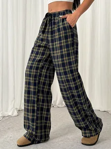 Detailed view of women's fashion yellow plaid wide-leg pants with elastic waist drawstring