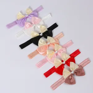 Set of multi-color infant elastic headbands featuring bicolor bows and heart pearls