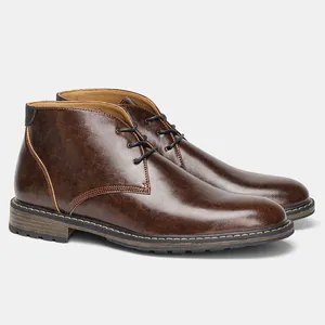 Side view of classic men's brown chukka boots with distressed retro leather finish