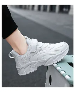 Close-up side view of children's white breathable mesh sports sneakers for school