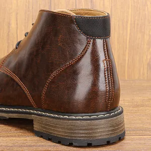Close-up of vintage brown leather men's boot heel featuring high-quality detailed stitching