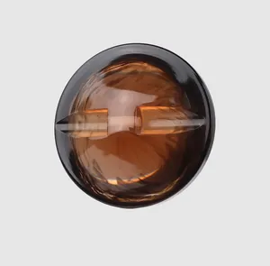 High-end Japanese resin button in translucent amber and black for decorative clothing