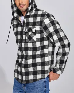 Detailed view of men's black and white checkered flannel hooded jacket with fleece lining