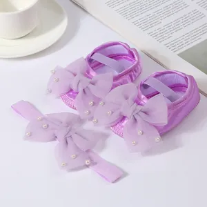 Purple satin baby shoes and headband gift set with pearl-embellished tulle bows