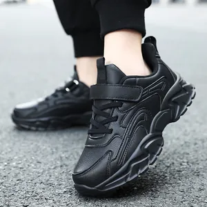 All-black children's sneakers featuring Velcro straps and anti-slip thick soles for school