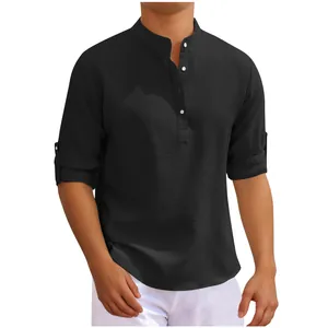 Close-up detail of a black waffle knit stand collar henley casual shirt for men