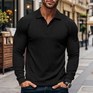 Close-up of black ribbed long-sleeve polo shirt for men in casual outdoor setting