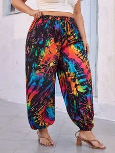 Vibrant multi-color tie-dye loose harem pants featuring a comfortable elastic waistband