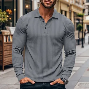 Close-up of grey long-sleeve ribbed polo shirt with three-button collar