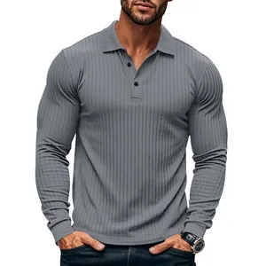 Detailed view of grey slim-fit ribbed polo shirt with long sleeves and lapel collar