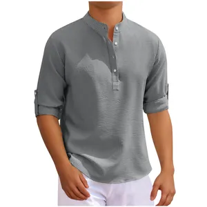 Detail of men's grey textured casual shirt with mandarin collar and button placket