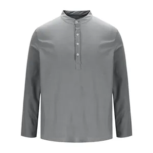 Close-up of gray long-sleeve waffle knit shirt with stand collar and buttons
