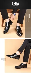 Elegant detail of men's black leather brogue shoes with vintage carved patterns