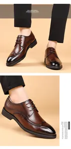 Detailed macro view of premium leather brogue shoes with vintage wingtip carving details.