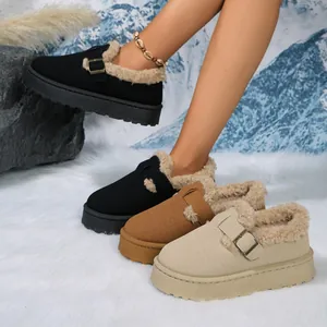 Stylish women's platform snow boots with warm faux fur lining and buckle detail.