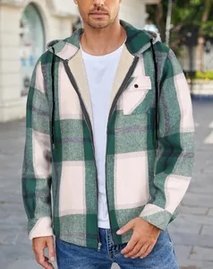 Close-up detail of men's green plaid flannel hooded jacket with warm sherpa lining