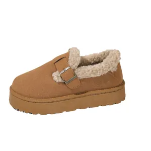 Chestnut brown faux suede platform snow boots with plush lining and buckle strap detail