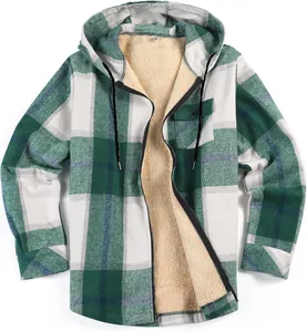 Detail view of green plaid flannel jacket featuring a warm sherpa fleece lining.
