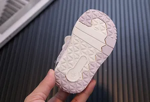 Macro detail of non-slip EVA soft sole with size marking for baby toddler walking shoes