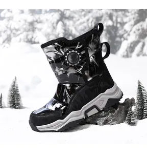 Detail view of waterproof children's snow boot with gear buckle in winter landscape