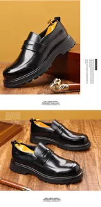 Macro detail of black genuine leather penny loafers featuring a durable thick rubber sole