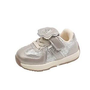 Stylish champagne metallic toddler sneakers with soft EVA sole and flower velcro strap