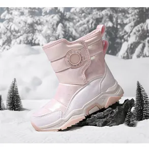 Pink winter snow boots for girls in outdoor snow scene with side-view detail
