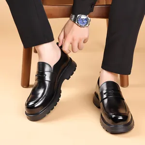 Classic men's black leather loafers with chunky soles and a stylish slip-on design.
