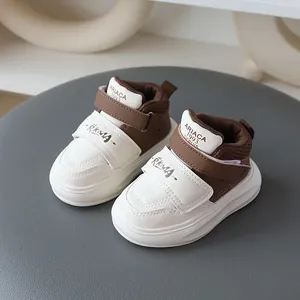 Stylish brown and white children's sneakers with anti-slip soft soles