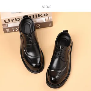 Top view of black men's leather business shoes with thick soles and round toes.