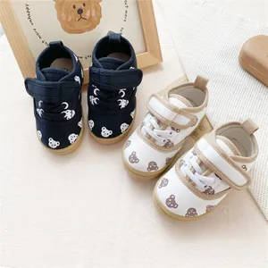 Adorable toddler canvas sneakers featuring cute bear patterns and soft rubber soles for kids