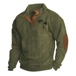 Detail of men's olive corduroy sweatshirt featuring chest palm tree print and elbow patches