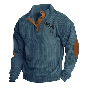 Detail of men's blue ribbed corduroy sweatshirt featuring a palm tree chest print