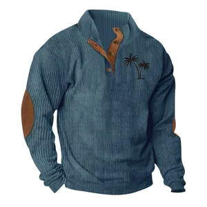 Detailed view of the blue ribbed corduroy sweatshirt with palm tree embroidery detail