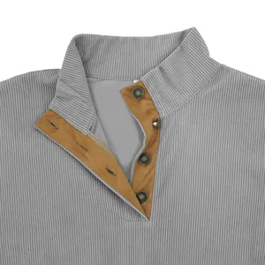 Detail of men's grey corduroy sweatshirt with stand-up collar and four-button placket