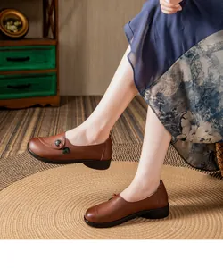 Brown soft-sole leather loafers for middle-aged women with non-slip rubber flat heel.