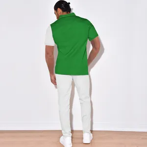 Back view of men's color block corduroy short sleeve shirt and white pants set.