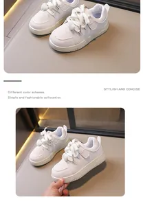 Detailed view of stylish white children's sneakers featuring cute heart-decorated laces