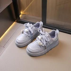 Stylish girls light blue skate sneakers with decorative heart-shaped pearl charms